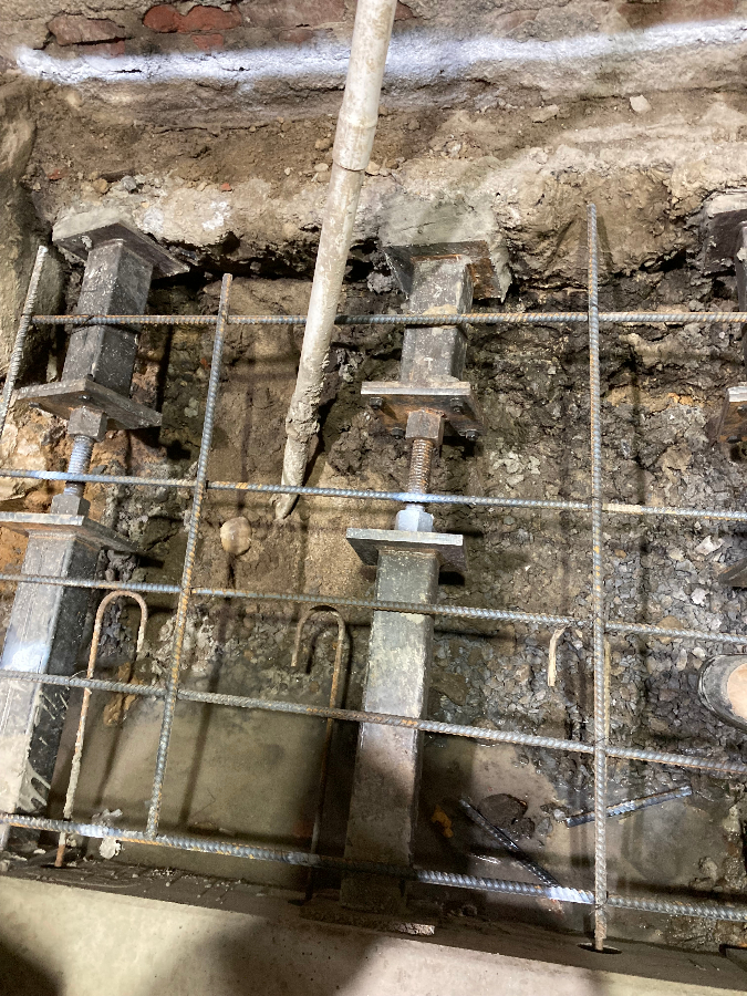 Shoring posts are seen amid rebar waiting for a concrete pour