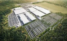 Aerial rendering of Rivian’s future $5-billion electric vehicle plant in Stanton Springs North, Georgia, depicting large white-roofed factory buildings surrounded by forest and highway access.