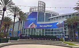 Exterior view of the Anaheim Convention Center with ServiceTitan signage and Pantheon 2025 banners displayed during the company’s annual user conference.