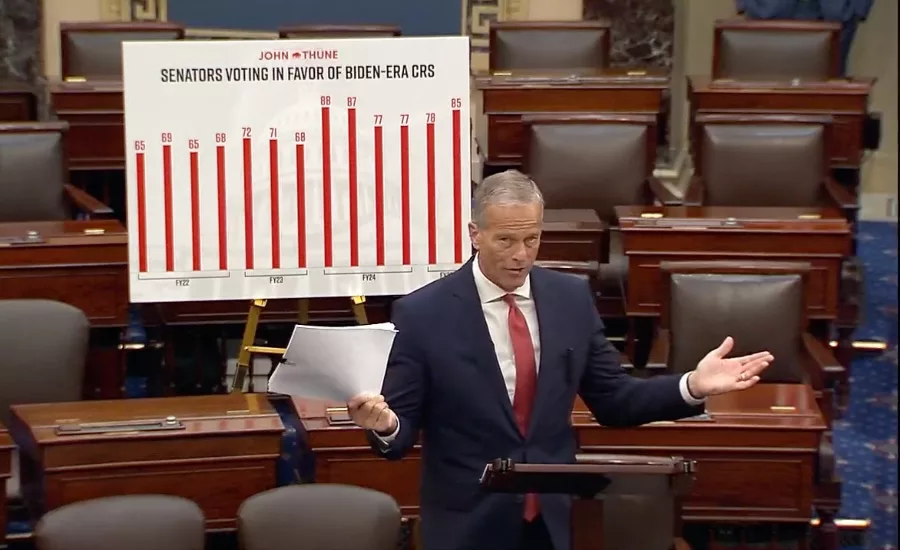 Sen. John Thune speaks on the Senate floor with a graph on past votes