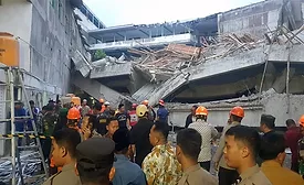 A joint search and rescue team, assisted by heavy equipment, is searching for and rescuing victims trapped in the collapse of an Islamic boarding school in Sidoarjo Regency, East Java, on Monday, Sept. 29.