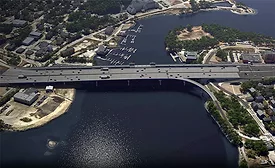 Aerial view of the Washington Bridge over the Seekonk River in Providence, R.I., showing active reconstruction of the westbound span.