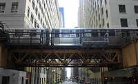 An Orange Line train approaching Quincy in the Loop in downtown Chicago.