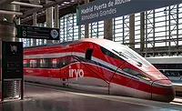 Iryo high-speed train at the Atocha station in Madrid waiting for passengers to board before leaving for Barcelona, Spain.