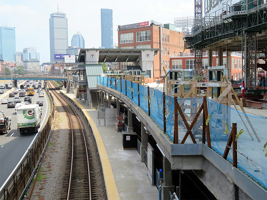 Construction above Lansdowne Station and the Massachusetts Turnpike showing early air-rights structural work connected to the Fenway Center project.