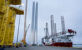 Offshore wind turbine components and installation vessels at a U.S. East Coast port.