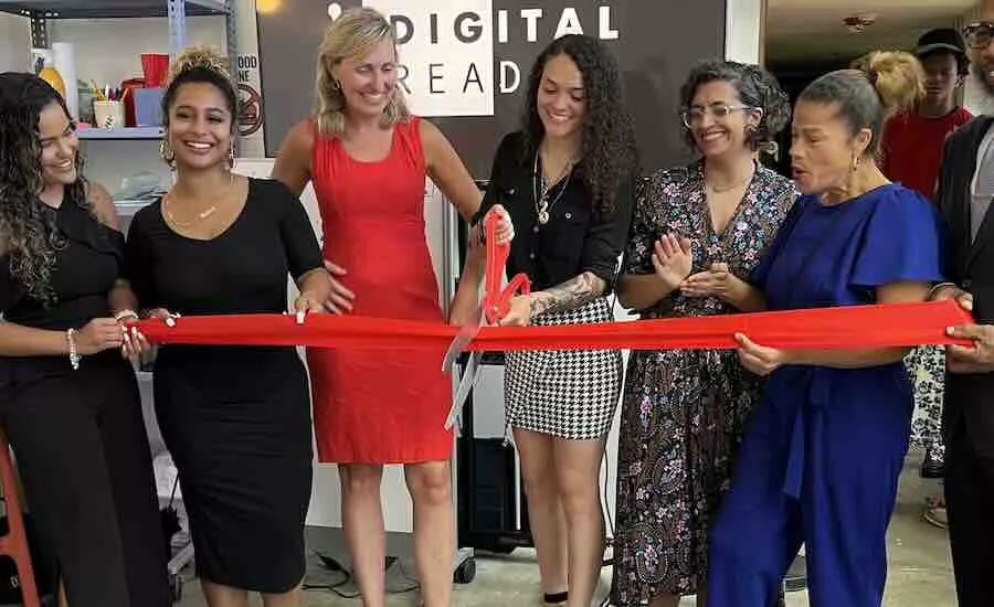 A photo at Digital Ready's ribbon cutting for its maker space in Boston