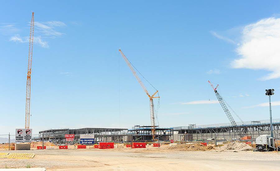 Wide view of Meta Mesa data center campus under construction with cranes and steel framework