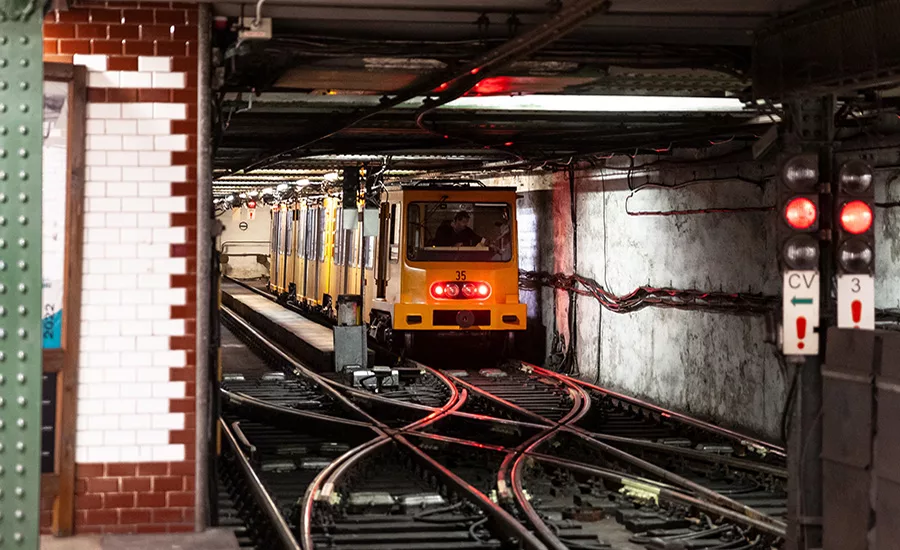 Budapest Metro Line M1 train in an underground tunnel.