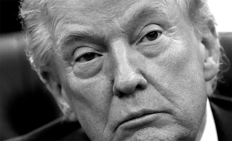 President Donald Trump listens to a question from a reporter as he speaks in the Oval Office of the White House, Monday, Feb. 2, 2026, in Washington