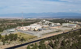 A giant federal nuclear research complex in New Mexico, with a history of WW2 and Cold War bomb component production, faces new state enforcement for delaying radioactive and chemical waste cleanup.