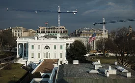 The White House with construction cranes visible behind the complex as excavation continues on the planned State Ballroom ahead of a March 5 federal planning vote.