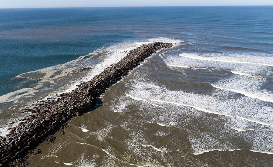 Aerial view of the Grays Harbor North Jetty extending into the Pacific Ocean.