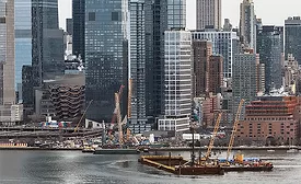 Barges and cranes work in the Hudson River near Manhattan during construction of the Gateway Hudson Tunnel Project.