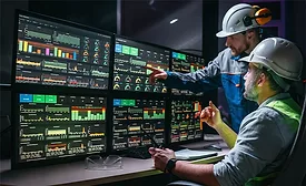 Engineers reviewing digital project data and technical dashboards.