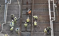 Workers installing rebar and pouring concrete for Hudson Yards tunnel casing project