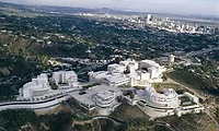 Getty Center Aerial view of the Getty Center's complex of white buildings surrounding a plaza, with the Los Angeles skyline in the distance.