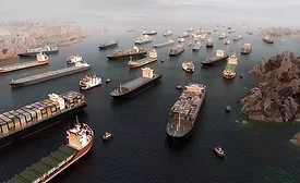 Cargo ships clustered in the Strait of Hormuz shipping lane.