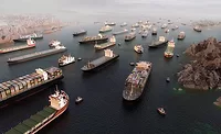 Cargo ships clustered in the Strait of Hormuz shipping lane.