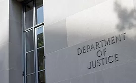 Department of Justice building exterior sign.