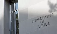 Department of Justice building exterior sign.