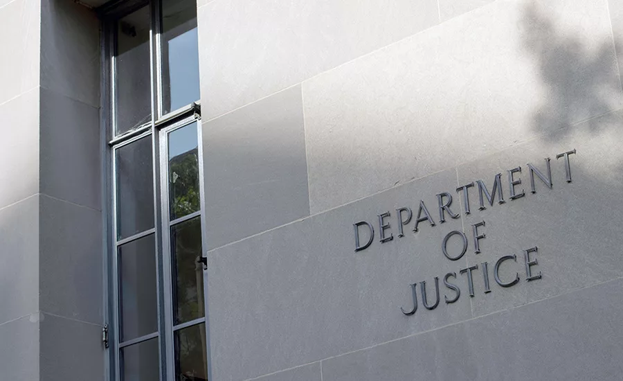 Department of Justice building exterior sign.
