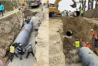 Mexican crews remove a broken pipe in the parallel gravity line