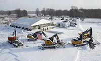 Micron-Fab-Plant---Bechtel Excavators and other construction equipment sit near a temporary event structure at Micron Technology's semiconductor manufacturing site in Clay, N.Y.