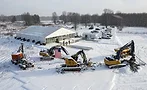Micron-Fab-Plant---Bechtel Excavators and other construction equipment sit near a temporary event structure at Micron Technology's semiconductor manufacturing site in Clay, N.Y.