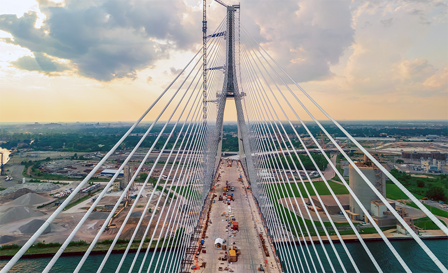 The Gordie Howe International Bridge, pictured under construction, has been delayed in opening for nearly two weeks without explanation.