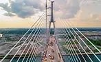 The Gordie Howe International Bridge, pictured under construction, has been delayed in opening for nearly two weeks without explanation.