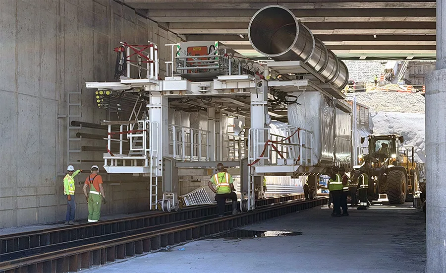Workers position a tunnel boring machine gantry for assembly on the Gateway Hudson Tunnel Project in June.