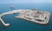 Aerial view of an artificial island with oil and gas processing facilities at the Upper Zakum offshore field in the UAE.