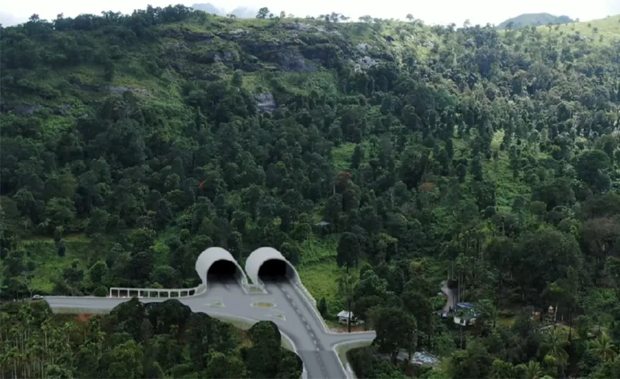 Concept rendering of the twin portals for the Anakkampoyil-Kalladi-Meppadi highway tunnel project in Kerala, India, set into a forested mountainside.