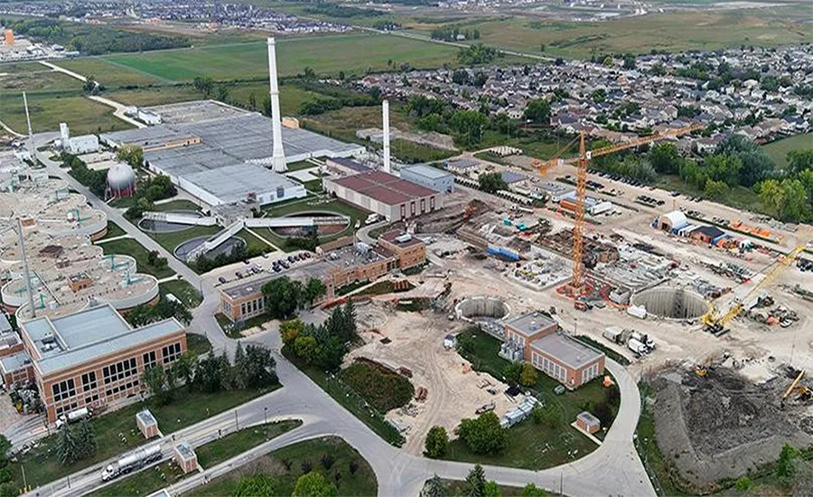 Aerial view of Winnipeg's North End Water Pollution Control Centre with active construction on the new biosolids facilities adjacent to the existing wastewater treatment plant.