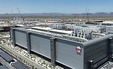 Aerial view of TSMC's Arizona semiconductor manufacturing campus in Phoenix with completed facilities and surrounding construction activity.