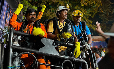  Rescue personnel prepare for overnight operations at the Teesta Stage-VI tunnel site in Sikkim.