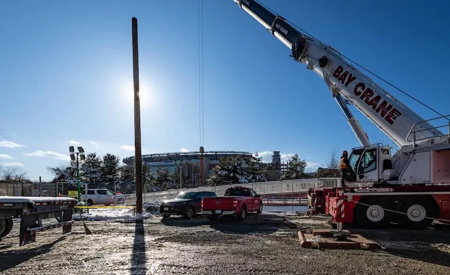 Setting precast platform at the Foxboro, Mass. commuter rail station