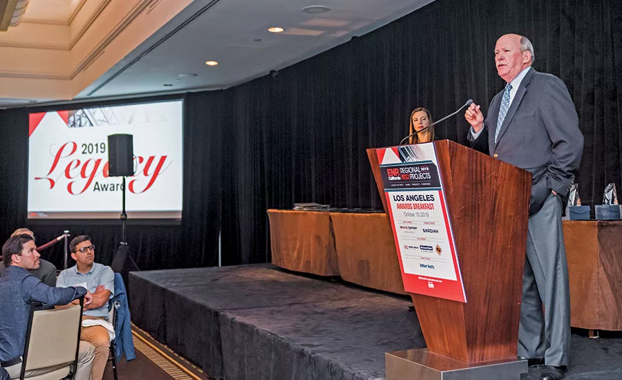 Craig L. Martin accepts the Legacy Award