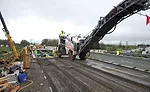 Crew removes asphalt