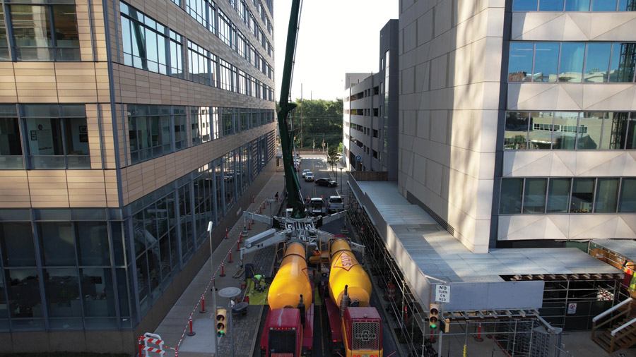cement trucks between buildings