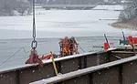 Crews used a lift to perform work