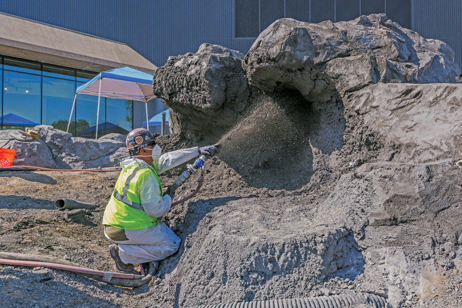 the worker applies shotcrete