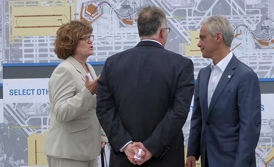 Ginger Evans briefs Mayor Emanuel at press conference