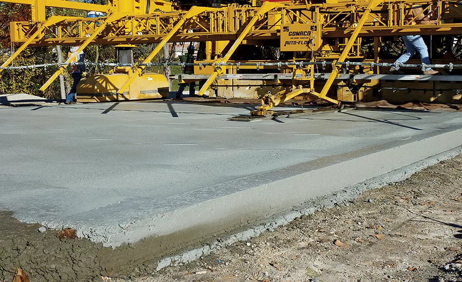 Crews pave a road segment in St. Louis, Mo.
