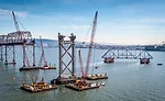 Tugboats guide section to port