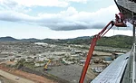 workers put finishing touches on exterior of control tower