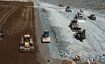GPS-controlled grader blades
