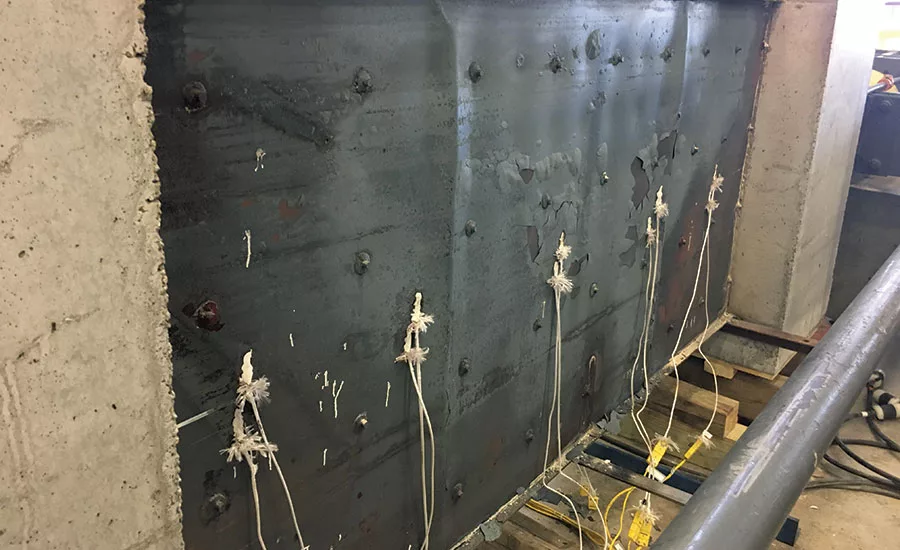 Concrete fill of tied steel-plate panels