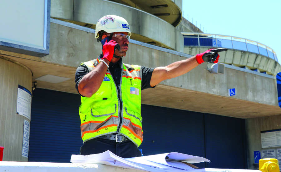 Keon B. West giving direction on a jobsite